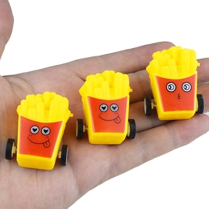Three mini cartoon french fry pull-back cars held in palm to show compact size