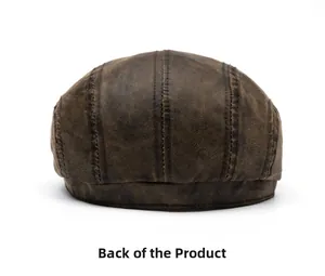 Rear view of dark brown vintage leather flat cap with detailed stitching and texture