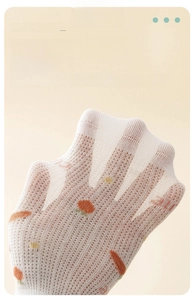 Close-up of white breathable honeycomb mesh kids socks with cute carrot patterns