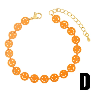Minimalist orange smiley face bracelet with gold-plated lobster clasp and extension chain