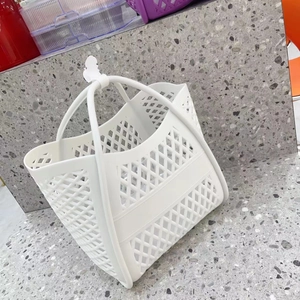 Close-up of a white silicone hollow shopping basket with a diamond-woven pattern
