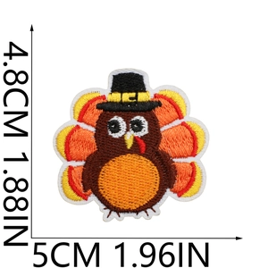 Close-up of embroidered Thanksgiving turkey patch showing detailed stitching and dimensions