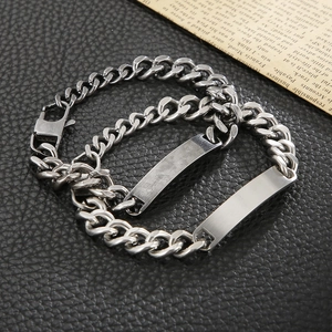 Men's silver-tone titanium steel Cuban chain bracelet with polished ID plate and lobster clasp