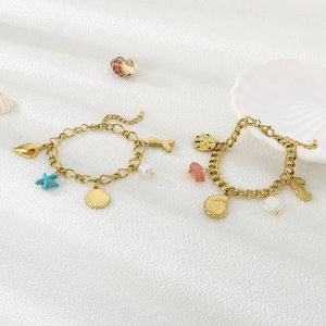 Bracelet océan en acier inoxydable doré 18 carats avec pendentifs étoile de mer et coquillage