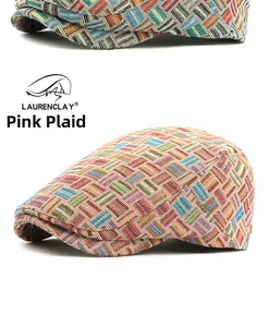 Detailed view of the multi-color woven plaid fabric texture on a retro flat cap