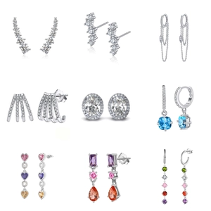 Collection of nine 925 sterling silver earrings with colorful cubic zirconia gemstones