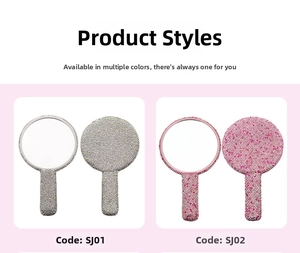 Detail view of rhinestone heart handheld mirrors in silver and pink with ABS handle