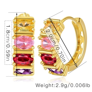 Detailed view of 18K gold-plated huggie earrings with colorful oval zircon stones
