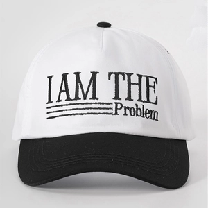 Close-up of I AM THE Problem embroidery on two-tone cotton twill baseball cap