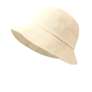 Chic off-white wide-brim bucket hat in textured fabric for sun protection