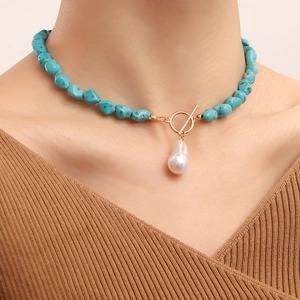 Irregular turquoise and baroque pearl pendant necklace with golden T-toggle clasp