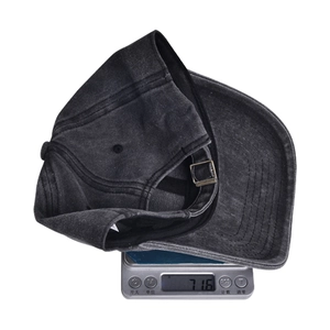 Classic dark grey washed denim baseball cap on scale showing 71.6g lightweight design