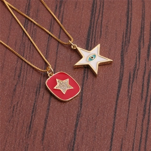Minimalist gold necklaces featuring a red rectangular star and a white star eye pendant