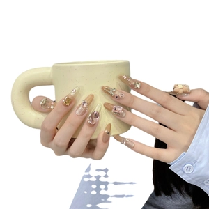 Handmade press-on nails with 3D bear, butterfly and pearls in long almond shape