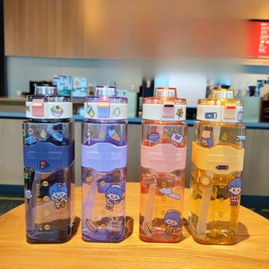 Detail showing 720ml square plastic water bottles with straws and silicone sleeves