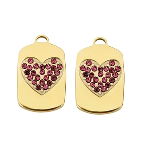 Detailed macro view of golden rectangular pendants with magenta heart-shaped rhinestones