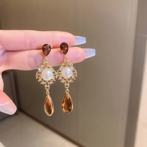 Boucles d'oreilles nœud vintage avec perles et pierres marron en forme de goutte d'eau