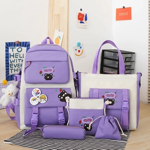 Close-up of a 5-piece purple and cream nylon school backpack set with cute bear patterns