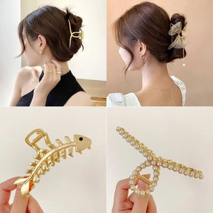 Elegant gold metal hair claw clips with pearls and ribbon bows for women hairstyle