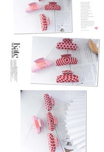 Detail of Valentine's Day hair claws with heart patterns and checkered prints