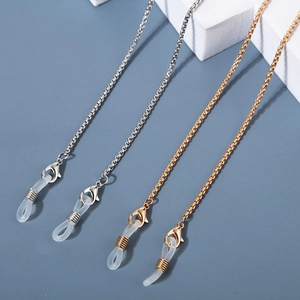 Detail of metal eyeglass chains with lobster clasps and clear silicone anti-slip rings