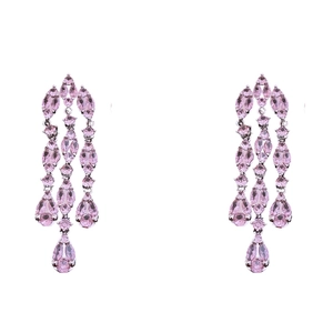 Elegant silver tassel earrings with pink zircon teardrop crystals on white background