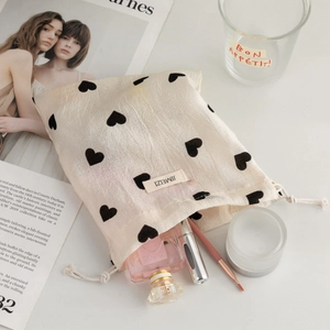 Champagne heart drawstring pouch for cosmetics and small accessories storage