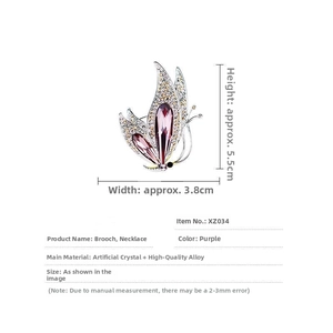 Macro shot of purple butterfly brooch with crystals and dimensions 5.5cm by 3.8cm