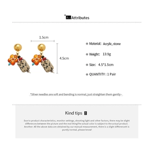 Detailed view of stone floral earrings with acrylic spotted pendants and size dimensions