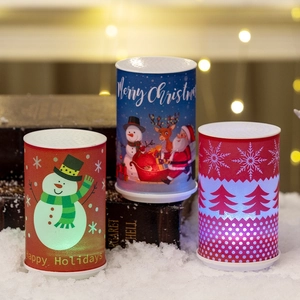 Festive Christmas cylinder LED night lights featuring Santa, snowman and reindeer designs
