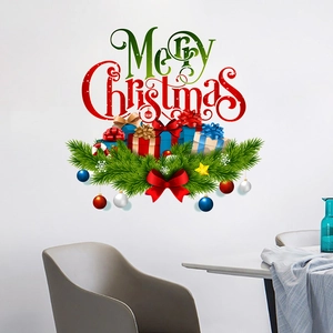 Merry Christmas wall decal featuring pine branches and ornaments in a home dining setting