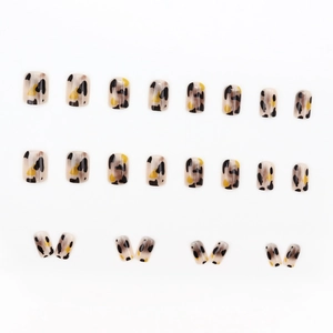Short square press-on nails with amber leopard pattern on a white background 24-piece set