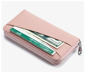 Pink leather long wallet featuring a star-shaped zipper and a front pocket for bills