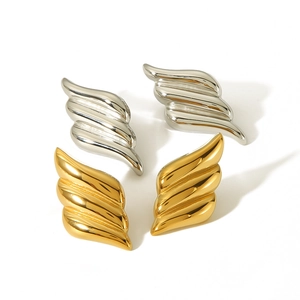 Polished stainless steel angel wing earrings in gold and silver finish on white background