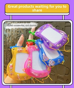 Close-up of guitar-shaped mini magnetic writing boards with colorful plastic hooks