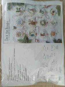 Detail of DIY embroidery kit for 12 Jolly and Bright Christmas ornaments and tool list