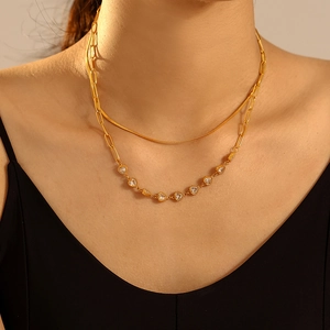 Double-layered gold stainless steel necklace with flat snake chain and zircon hearts