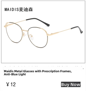 Close-up of gold and black metal oval eyeglasses frame with anti-blue light lenses
