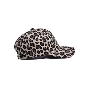 Detailed side view of leopard print baseball cap featuring curved brim and metal buckle