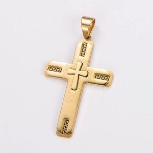 Macro shot of gold stainless steel cross pendant with intricate relief and Greek key patterns