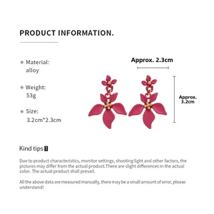 Tableau des tailles détaillé des boucles d'oreilles fleur rose avec dimensions