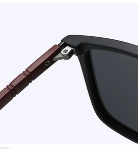 Detailed close-up of the durable metal hinge and matte frame on polarized sunglasses