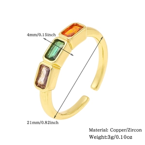 Detail view of gold open ring with rectangle colorful zircons and size specifications
