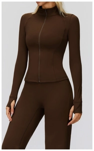 Detail of deep brown athletic jacket featuring thumbhole cuffs and a full-zip stand collar