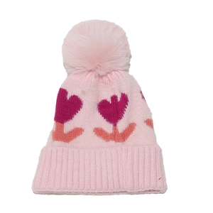 Close-up of pink knit baby hat with ribbed cuff and tulip heart jacquard patterns