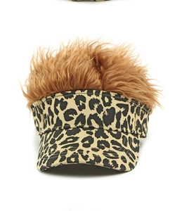 Close-up of leopard print visor cap featuring funny synthetic brown hair decoration