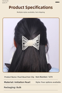 Detail of elegant butterfly-shaped pearl hair comb with intricate beaded patterns
