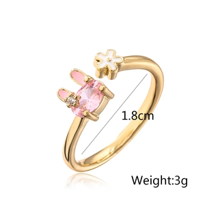 Detail view of gold rabbit ring with dimensions showing 1.8cm diameter and 3g weight