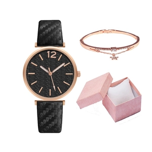 Women's quartz watch and gold star bracelet gift set in textured pink jewelry box