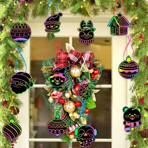 DIY Christmas scratch art hanging tags set for kids with colorful winter holiday motifs